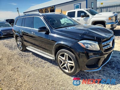 Czwarte zdjęcie samochodu z boku: 2017 MERCEDES-BENZ GLS 550 4MATIC VIN:4JGDF7DE5HA832613 - miniatura