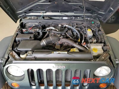 Zdjęcie 11 z 12 samochodu: 2010 JEEP WRANGLER SPORT VIN:1J4AA2D11AL196699 - miniatura