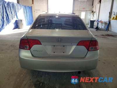 Zdjęcie 6 z 12 samochodu: 2006 HONDA CIVIC LX VIN:1HGFA16596L013354 - miniatura