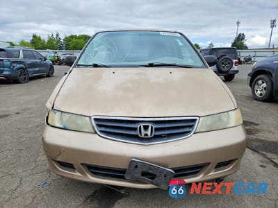Piąte zdjęcie samochodu w środku: 2002 HONDA ODYSSEY LX VIN:2HKRL18572H519590 - miniatura
