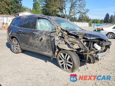 Czwarte zdjęcie samochodu z boku: 2017 HONDA PILOT ELITE VIN:5FNYF6H01HB047284 - miniatura