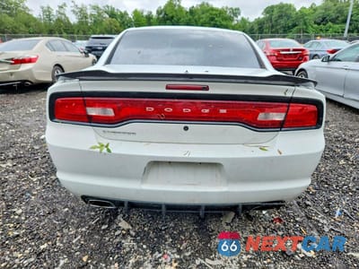 Zdjęcie 6 z 12 samochodu: 2012 DODGE CHARGER POLICE VIN:2C3CDXAT7CH305356 - miniatura
