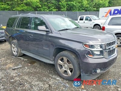 Czwarte zdjęcie samochodu z boku: 2016 CHEVROLET TAHOE K1500 LS VIN:1GNSKAKC4GR293219 - miniatura