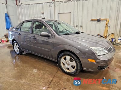 Czwarte zdjęcie samochodu z boku: 2007 FORD FOCUS ZX4 VIN:1FAFP34N87W178314 - miniatura