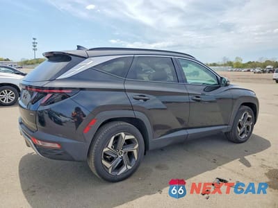 Trzecie zdjęcie samochodu z tyłu: 2024 HYUNDAI TUCSON LIMITED VIN:5NMJECDE6RH396607 - miniatura