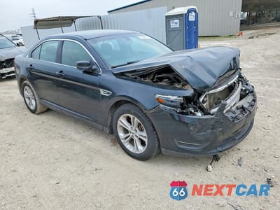 Czwarte zdjęcie samochodu z boku: 2014 FORD TAURUS VIN:1FAHP2E80EG182022 - miniatura