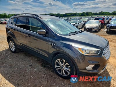 Czwarte zdjęcie samochodu z boku: 2018 FORD ESCAPE SEL VIN:1FMCU0HD4JUA47725 - miniatura