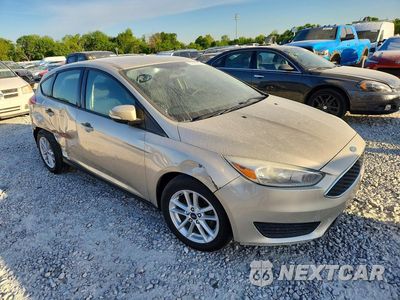 Czwarte zdjęcie samochodu z boku: 2017 FORD FOCUS SE VIN:1FADP3K21HL318335 - miniatura