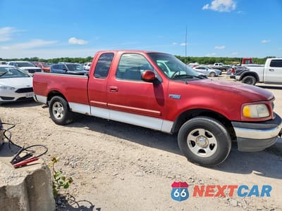 Czwarte zdjęcie samochodu z boku: 2000 FORD F150 VIN:1FTZX1727YNB56647 - miniatura