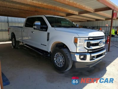 Czwarte zdjęcie samochodu z boku: 2022 FORD F250 SUPER DUTY VIN:1FT8W2BT2NEE23810 - miniatura