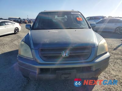Piąte zdjęcie samochodu w środku: 2005 HONDA PILOT EX VIN:2HKYF18425H569960 - miniatura
