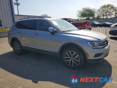 Czwarte zdjęcie samochodu z boku: 2021 VOLKSWAGEN TIGUAN SE VIN:3VV2B7AX7MM014117 - miniatura