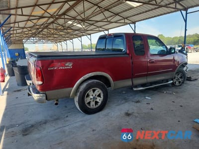 Trzecie zdjęcie samochodu z tyłu: 2002 FORD F150 VIN:1FTRX18L22NB73368 - miniatura