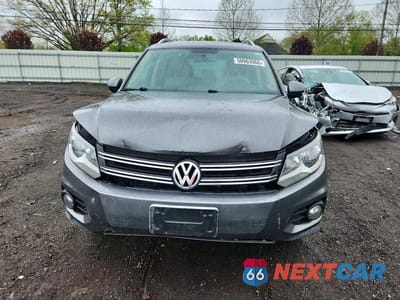 Piąte zdjęcie samochodu w środku: 2013 VOLKSWAGEN TIGUAN S VIN:WVGAV3AX3DW076023 - miniatura