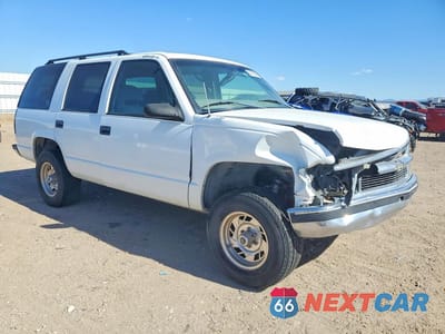 Czwarte zdjęcie samochodu z boku: 1999 CHEVROLET TAHOE K1500 VIN:1GNEK13R4XJ382724 - miniatura