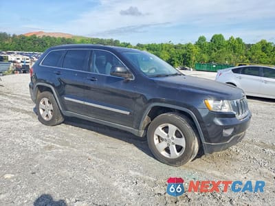 Czwarte zdjęcie samochodu z boku: 2011 JEEP GRAND CHEROKEE LAREDO VIN:1J4RS4GG1BC513944 - miniatura