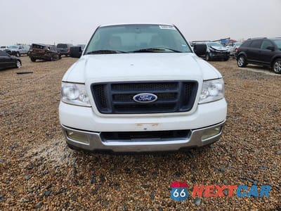 Piąte zdjęcie samochodu w środku: 2004 FORD F150 VIN:1FTPX12594NB40517 - miniatura