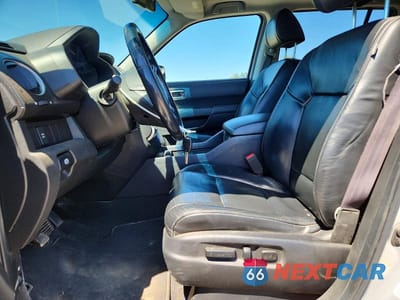 Zdjęcie 7 z 13 samochodu: 2011 HONDA PILOT EXL VIN:5FNYF4H5XBB062938 - miniatura