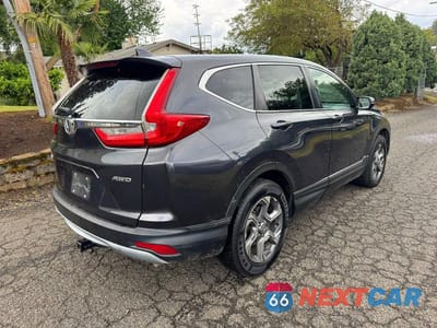 Czwarte zdjęcie samochodu z boku: 2018 HONDA CR-V EXL VIN:2HKRW2H8XJH603991 - miniatura