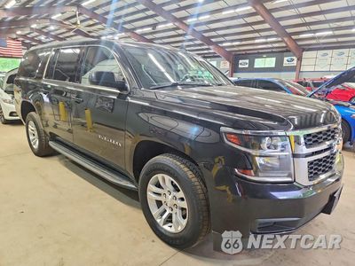 Czwarte zdjęcie samochodu z boku: 2019 CHEVROLET SUBURBAN K1500 LS VIN:1GNSKGKC7KR312602 - miniatura