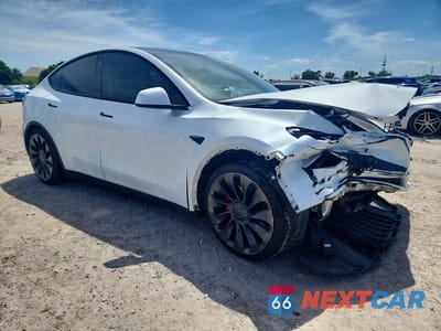 Czwarte zdjęcie samochodu z boku: 2022 TESLA MODEL Y VIN:7SAYGDEF9NF361256 - miniatura