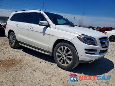 Czwarte zdjęcie samochodu z boku: 2014 MERCEDES-BENZ GL 450 4MATIC VIN:4JGDF7CEXEA399626 - miniatura
