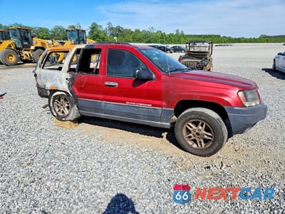 Czwarte zdjęcie samochodu z boku: 2004 JEEP GRAND CHEROKEE LAREDO VIN:1J4GW48S64C264722 - miniatura