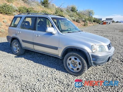Czwarte zdjęcie samochodu z boku: 1999 HONDA CR-V EX VIN:JHLRD1764XC008769 - miniatura