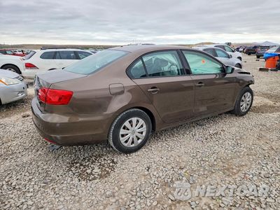 Trzecie zdjęcie samochodu z tyłu: 2014 VOLKSWAGEN JETTA BASE VIN:3VW1K7AJ2EM324745 - miniatura