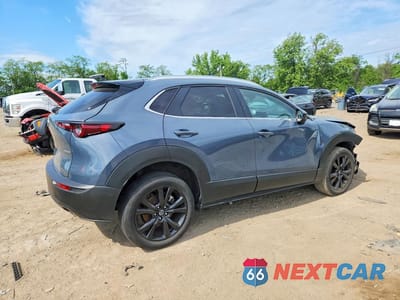 Trzecie zdjęcie samochodu z tyłu: 2025 MAZDA CX-30 AWD S CARBON EDITION VIN:3MVDMBCM7SM812443 - miniatura