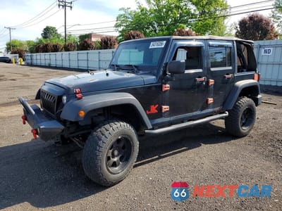 2009 JEEP WRANGLER UNLIMITED X 1J4GA39189L752446 - główne zdjęcie licytacji z USA - miniatura