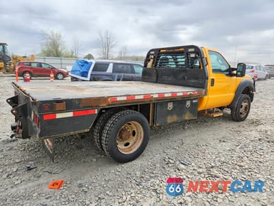 Trzecie zdjęcie samochodu z tyłu: 2014 FORD F550 SUPER DUTY VIN:1FDUF5HY4EEA62420 - miniatura