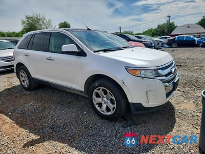 Czwarte zdjęcie samochodu z boku: 2011 FORD EDGE SEL VIN:2FMDK4JC5BBA29132 - miniatura