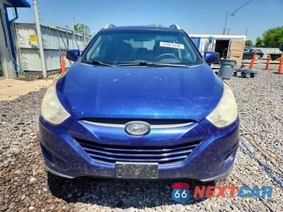 Piąte zdjęcie samochodu w środku: 2011 HYUNDAI TUCSON GLS VIN:KM8JU3AC7BU171077 - miniatura
