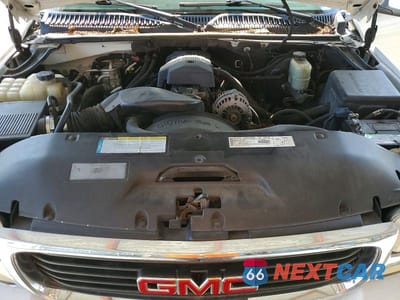Zdjęcie 12 z 14 samochodu: 2000 GMC YUKON VIN:1GKEK13T0YJ211639 - miniatura