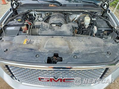 Zdjęcie 12 z 14 samochodu: 2017 GMC YUKON XL DENALI VIN:1GKS2HKJ9HR215184 - miniatura