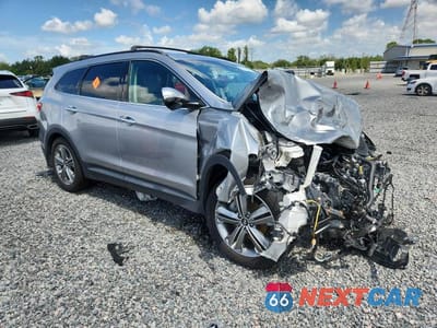 Czwarte zdjęcie samochodu z boku: 2015 HYUNDAI SANTA FE GLS VIN:KM8SN4HF1FU102740 - miniatura