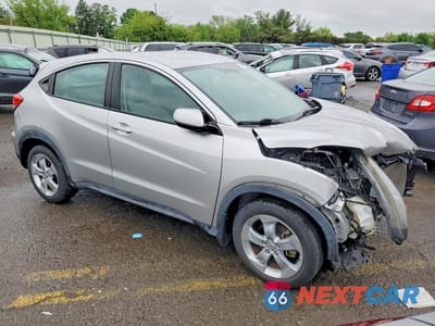Czwarte zdjęcie samochodu z boku: 2016 HONDA HR-V LX VIN:3CZRU6H32GM748098 - miniatura