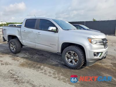 Czwarte zdjęcie samochodu z boku: 2020 CHEVROLET COLORADO Z71 VIN:1GCGTDEN1L1161912 - miniatura