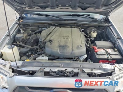 Zdjęcie 11 z 12 samochodu: 2015 TOYOTA TACOMA V6 VIN:3TMLU4EN7FM178586 - miniatura