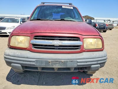 Piąte zdjęcie samochodu w środku: 1999 CHEV TRACKER VIN:2CNBJ13C9X6912866 - miniatura