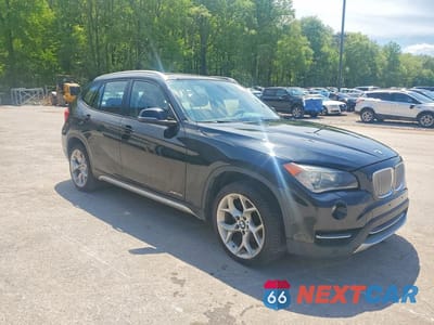 Czwarte zdjęcie samochodu z boku: 2014 BMW X1 XDRIVE28I VIN:WBAVL1C55EVY17028 - miniatura