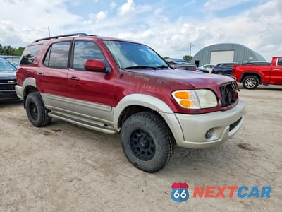 Czwarte zdjęcie samochodu z boku: 2001 TOYOTA SEQUOIA SR5 VIN:5TDZT34AX1S030513 - miniatura