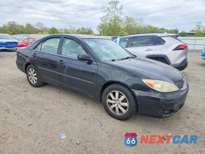 Czwarte zdjęcie samochodu z boku: 2003 TOYOTA CAMRY XLE VIN:4T1BE30KX3U152292 - miniatura