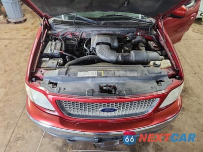 Zdjęcie 11 z 12 samochodu: 2001 FORD F150 VIN:1FTRX18L11NB36620 - miniatura
