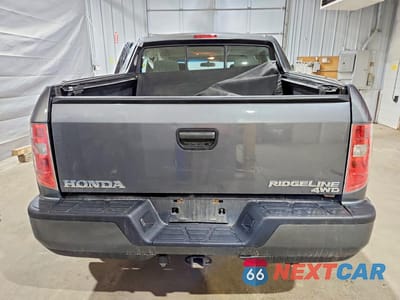 Zdjęcie 6 z 12 samochodu: 2011 HONDA RIDGELINE RT VIN:5FPYK1F29BB453220 - miniatura