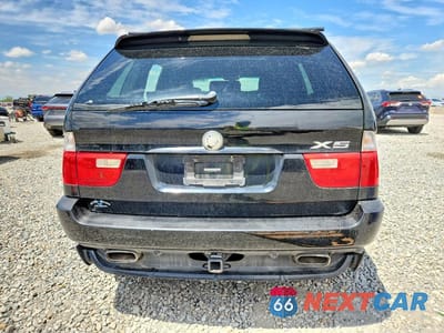 Zdjęcie 6 z 13 samochodu: 2004 BMW X5 4.8IS VIN:5UXFA93574LE81986 - miniatura