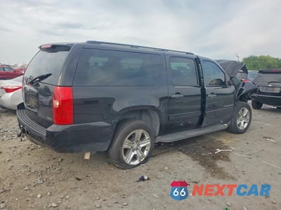 Trzecie zdjęcie samochodu z tyłu: 2010 CHEVROLET SUBURBAN C1500 LS VIN:1GNUCHE06AR260262 - miniatura