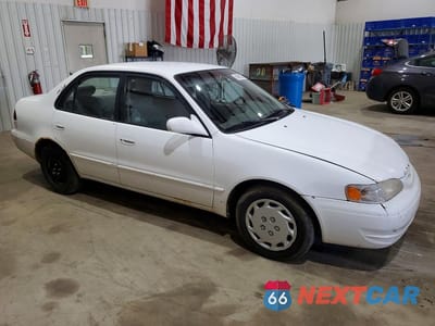 Czwarte zdjęcie samochodu z boku: 1999 TOYOTA COROLLA VE VIN:1NXBR12EXXZ209984 - miniatura