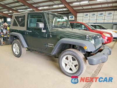 Czwarte zdjęcie samochodu z boku: 2010 JEEP WRANGLER SPORT VIN:1J4AA2D11AL196699 - miniatura